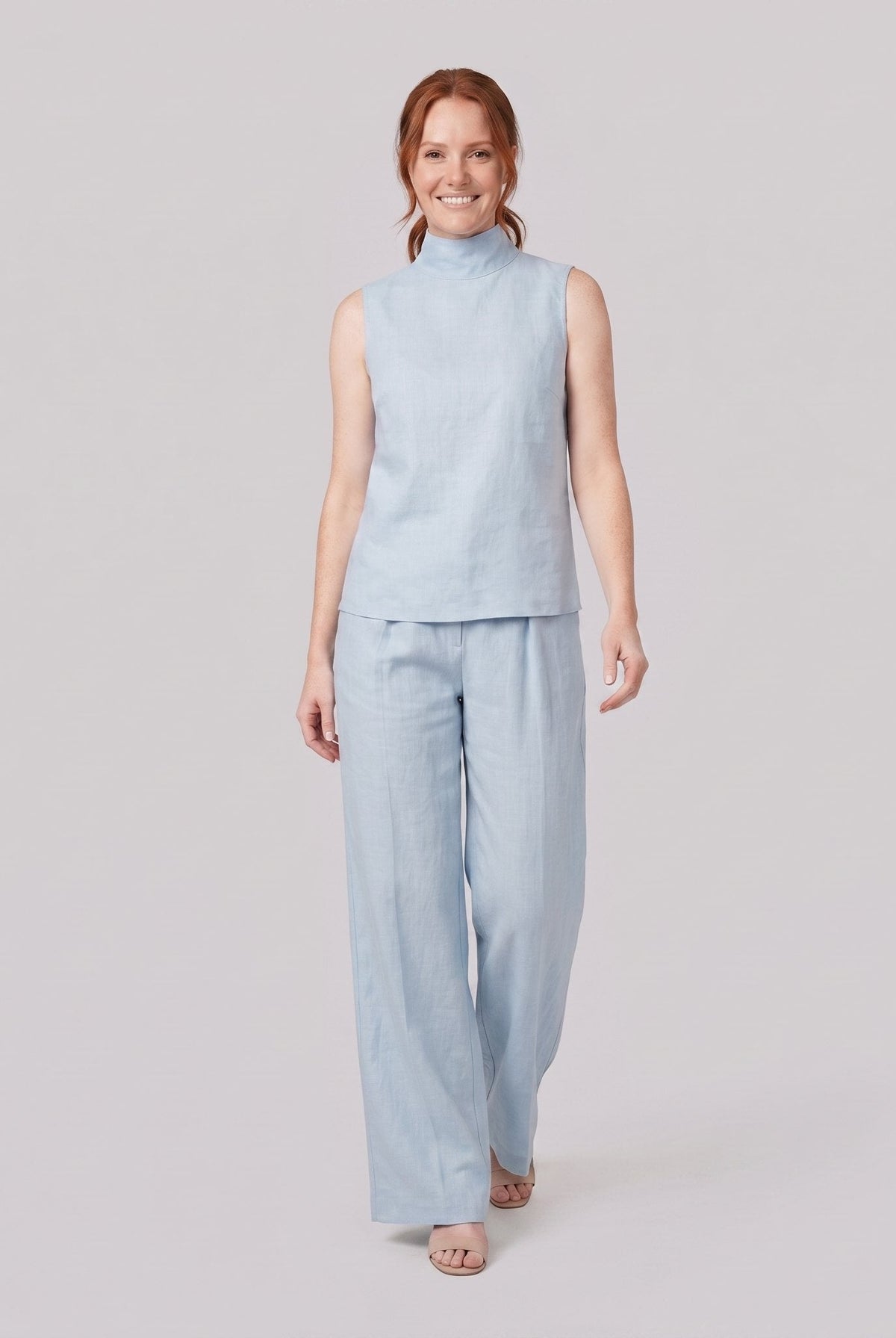 Mira two-piece set in light blue, sleeveless high-neck blouse with wide-leg trousers