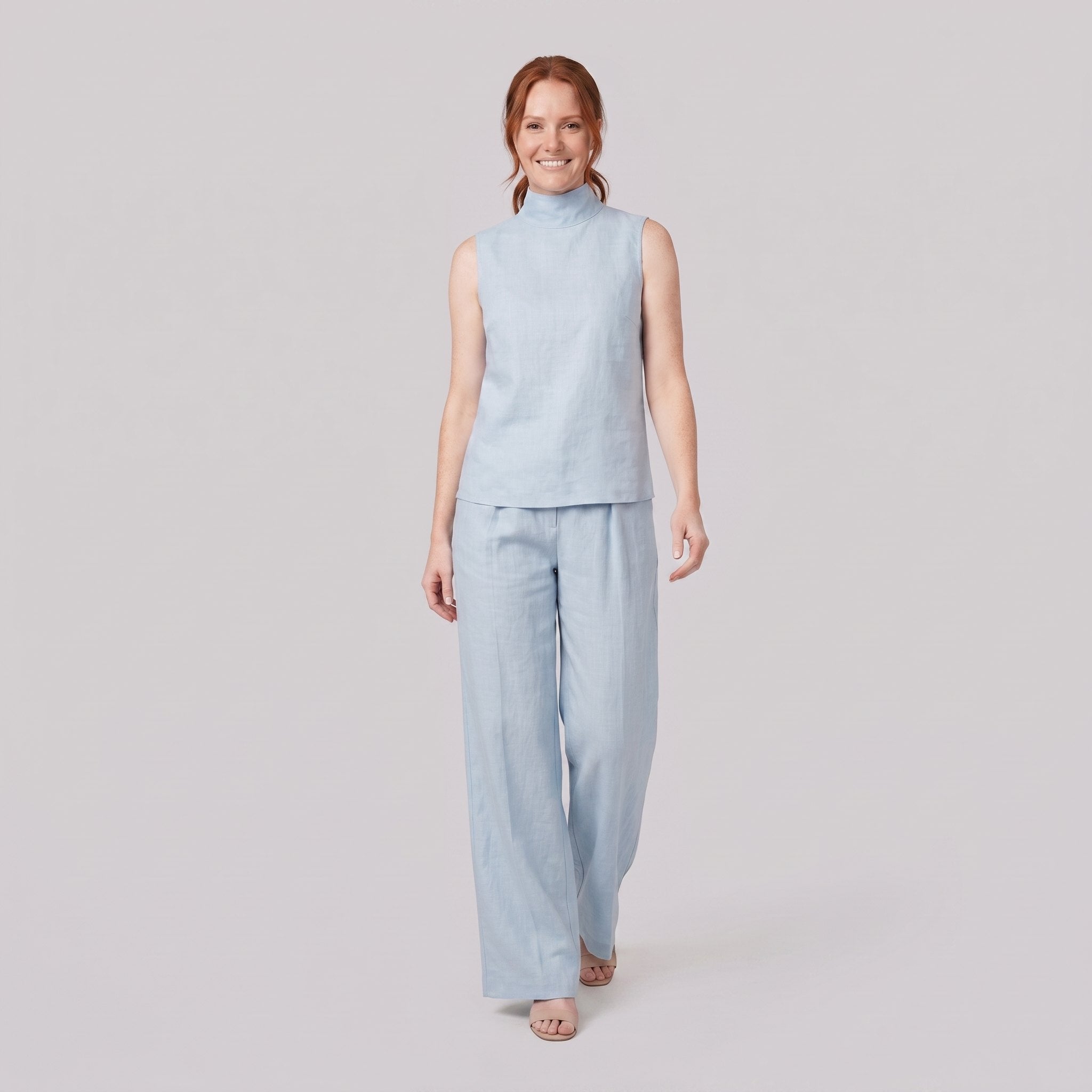 Mira two-piece set in light blue, sleeveless high-neck blouse with wide-leg trousers
