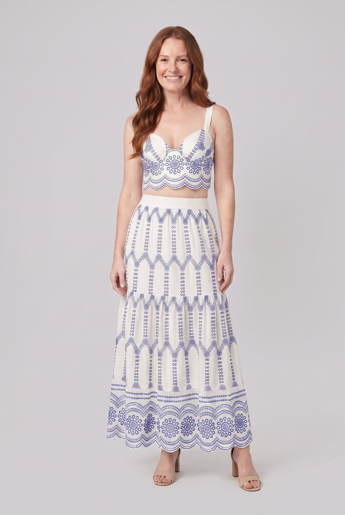 Pinta ivory broderie skirt set with blue embroidery - bralette top and tiered maxi skirt, front view