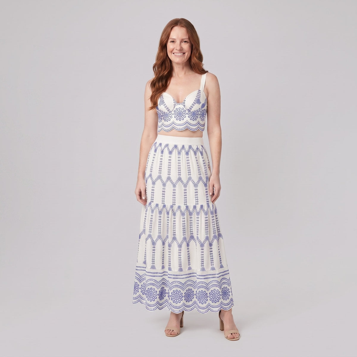 Pinta ivory broderie skirt set with blue embroidery - bralette top and tiered maxi skirt, front view