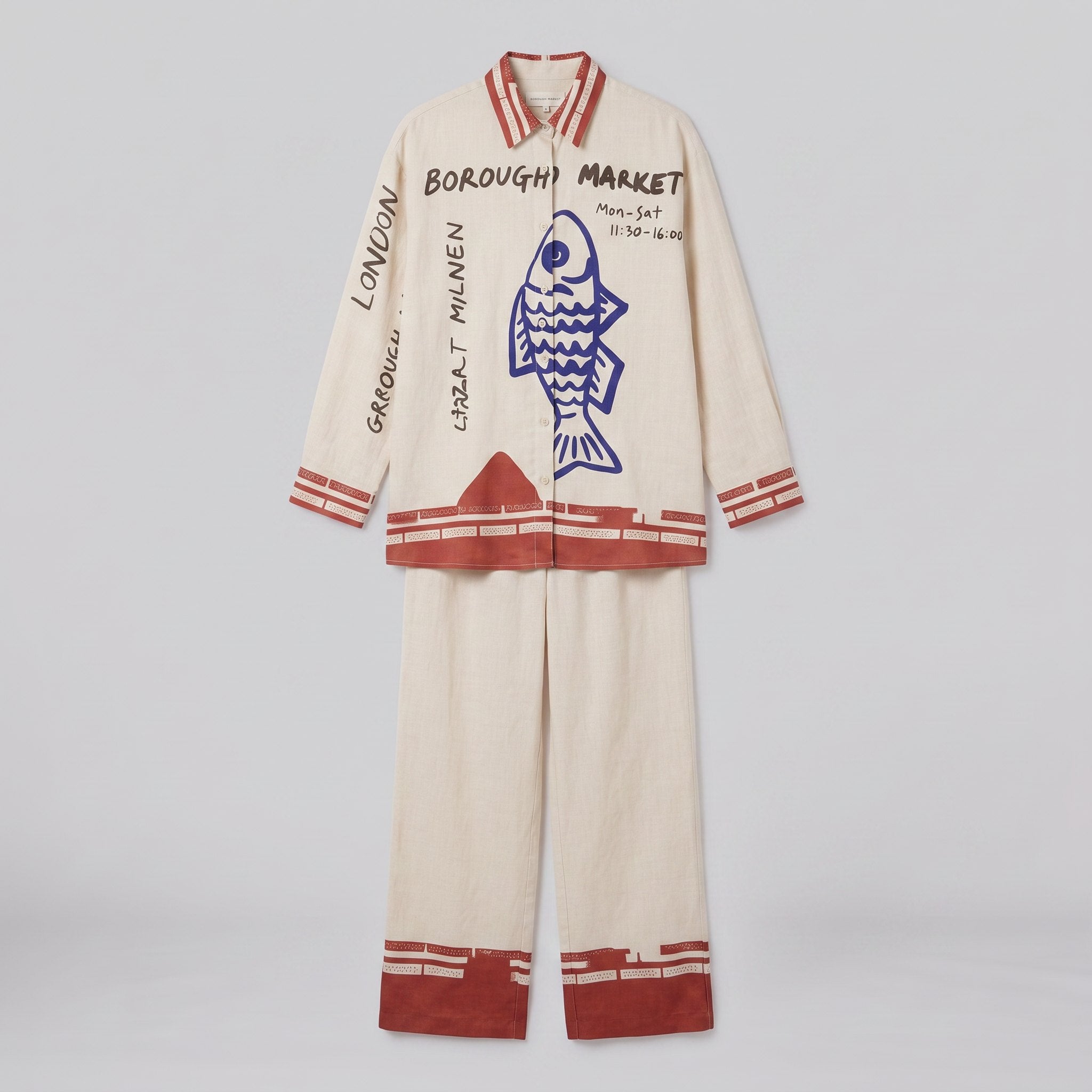 Rounelle cream linen set flat lay, shirt and trousers with blue fish print