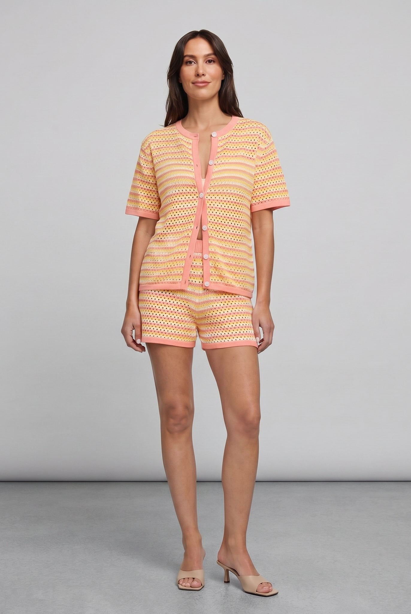 Sola Knitted Co Ord Set in citrus yellow and cream stripes — open-crochet cardigan and shorts