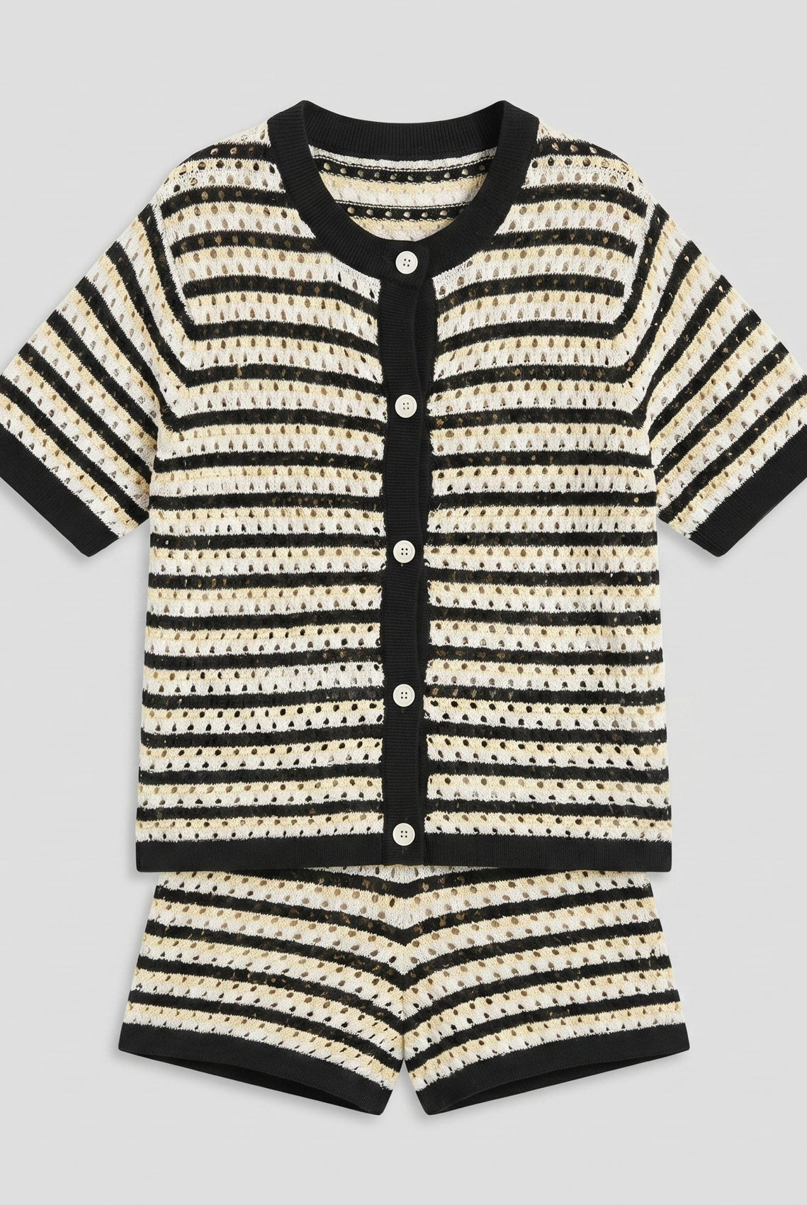 Sola Knitted Co Ord Set black and cream striped knit fabric detail flat-lay