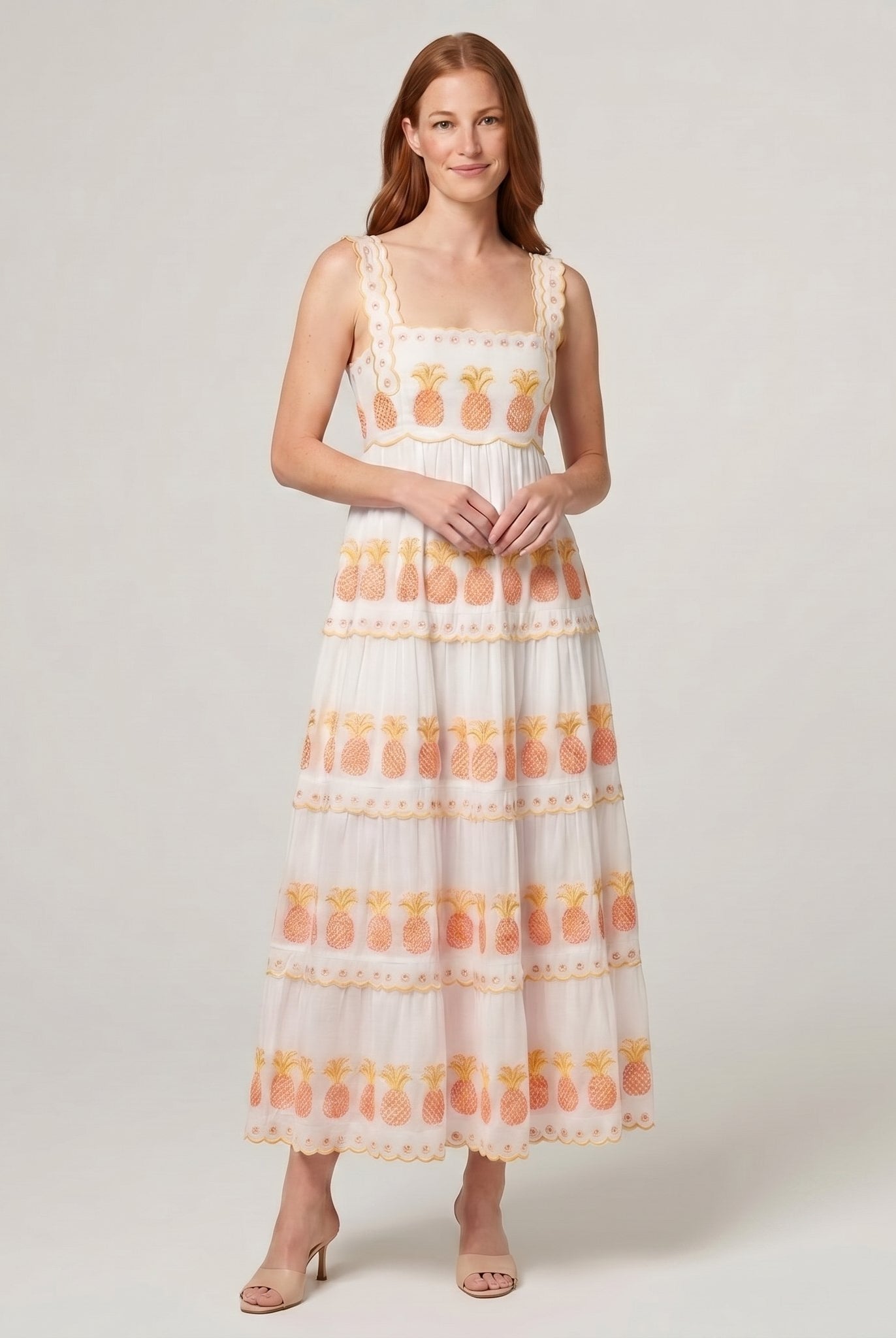 White pineapple-embroidered tiered maxi dress, front view on model