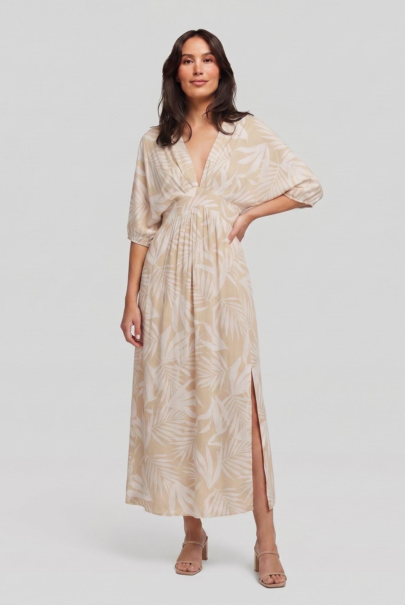 Women's beige tropical-print A-line maxi dress with 3/4 sleeves, full-length model photo