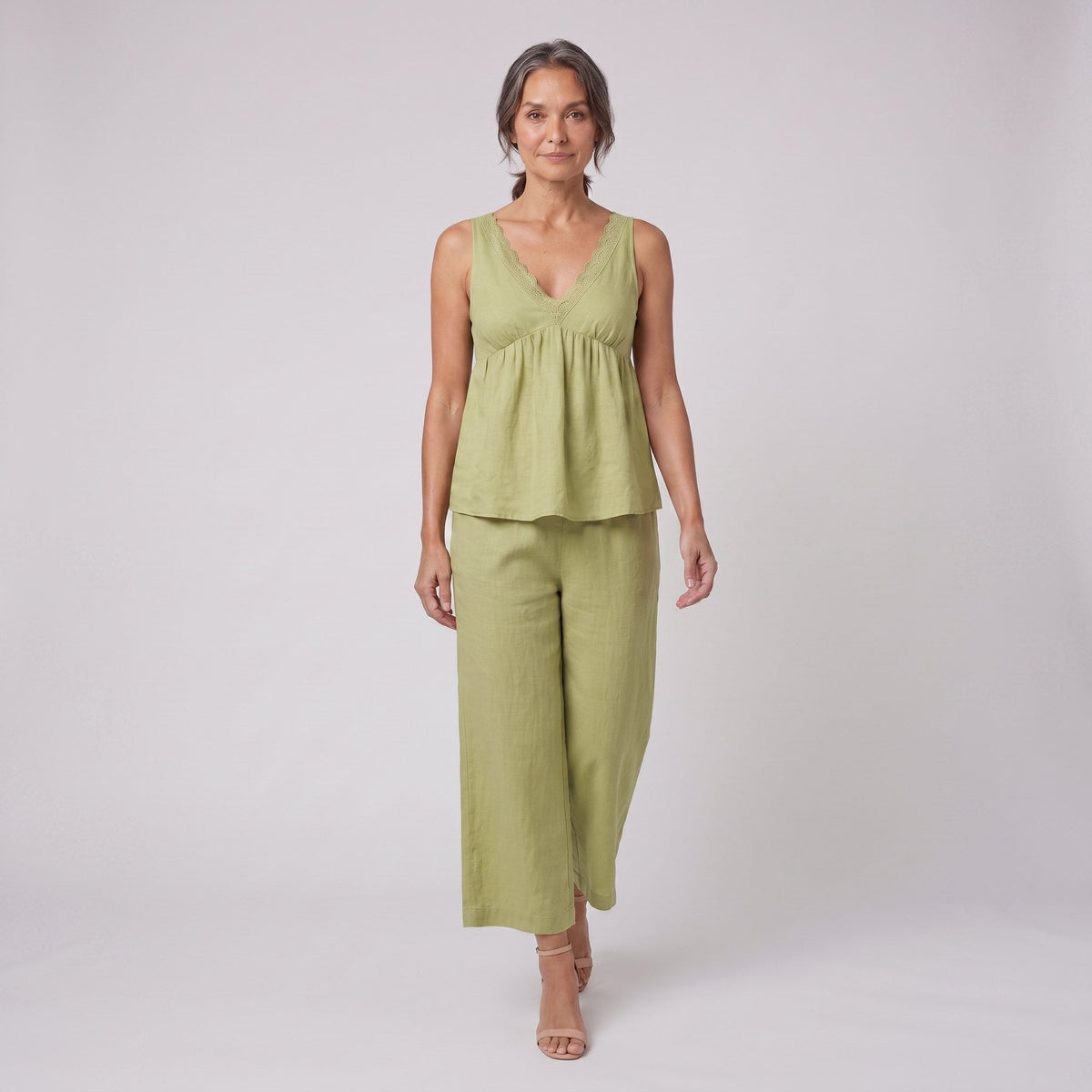 Vera sage green lace-trimmed loungewear set walking