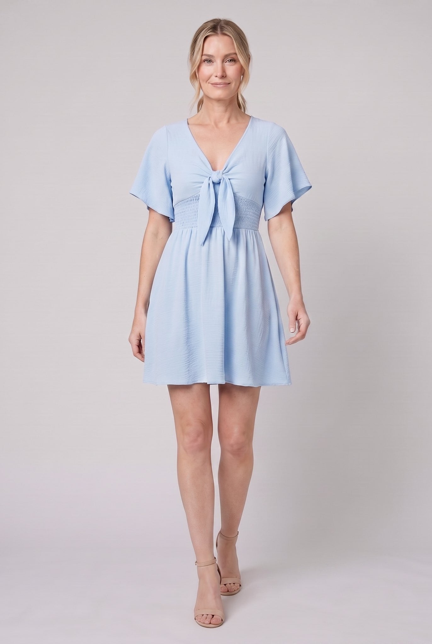 Light blue V-neck bow-tie mini dress