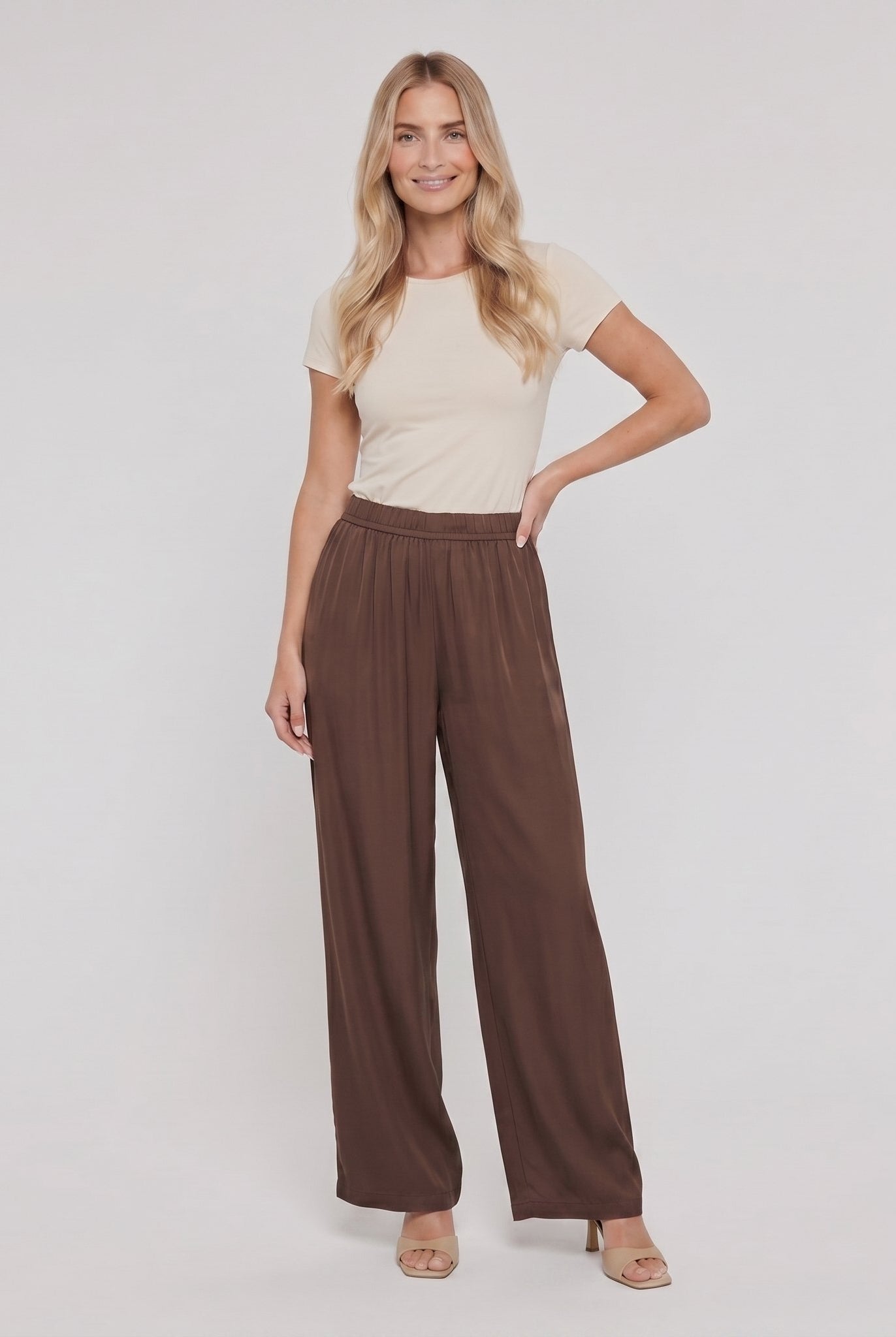 Pamela Boutique brown high-waist wide-leg trousers, model front view