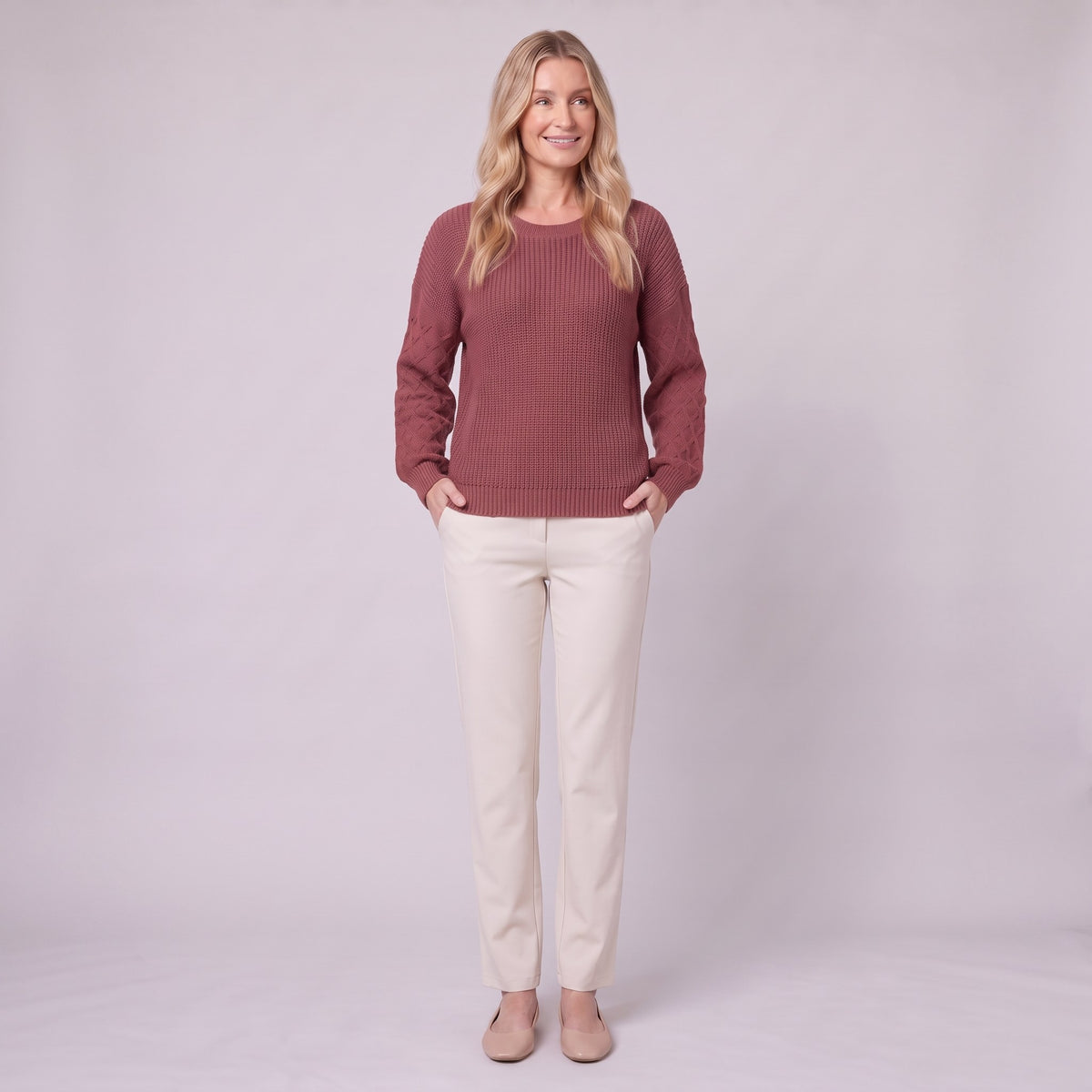 Amalie ribbed pullover in red, full-length view with hands in pockets