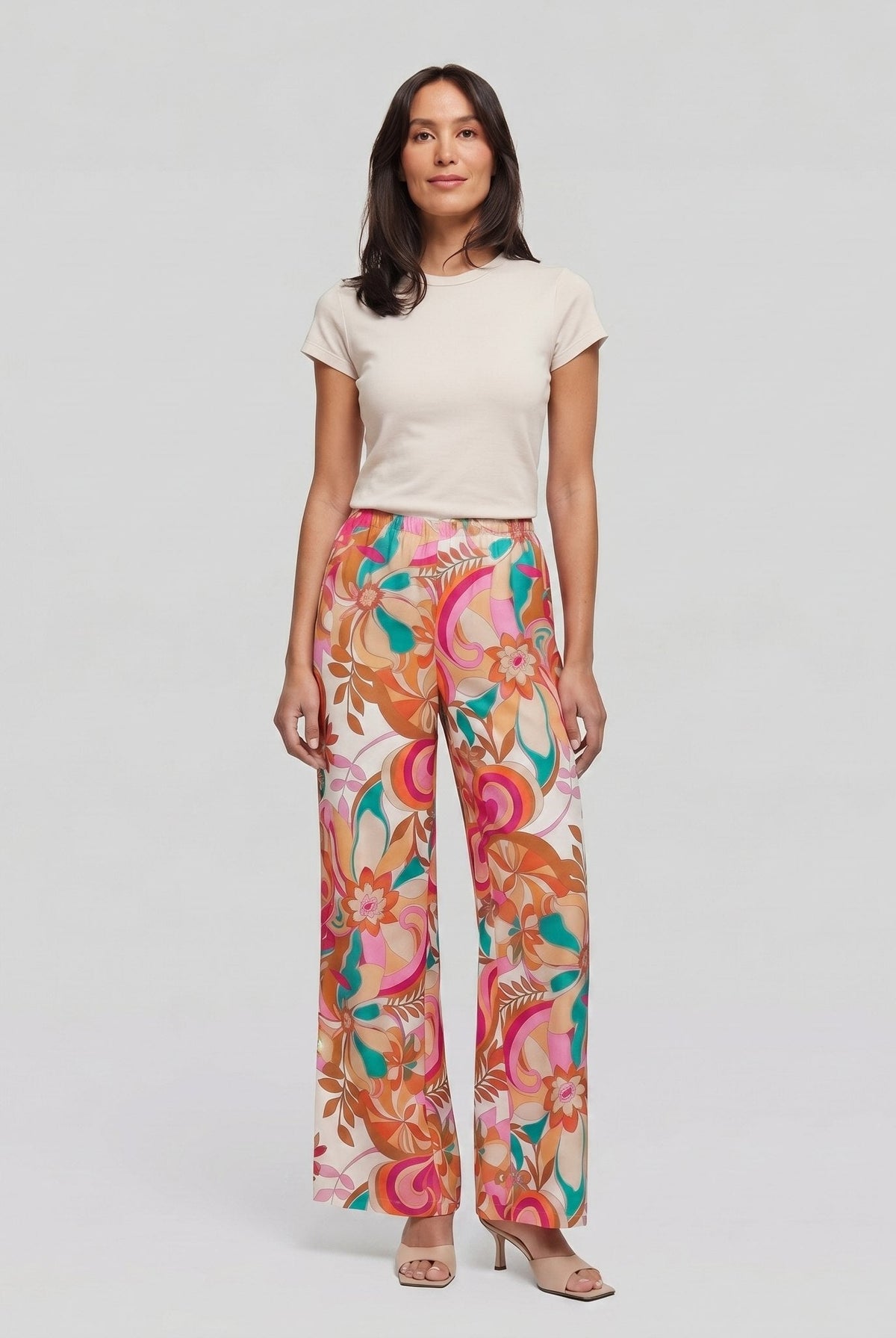Pamela Boutique pink floral wide-leg flared trousers, model view