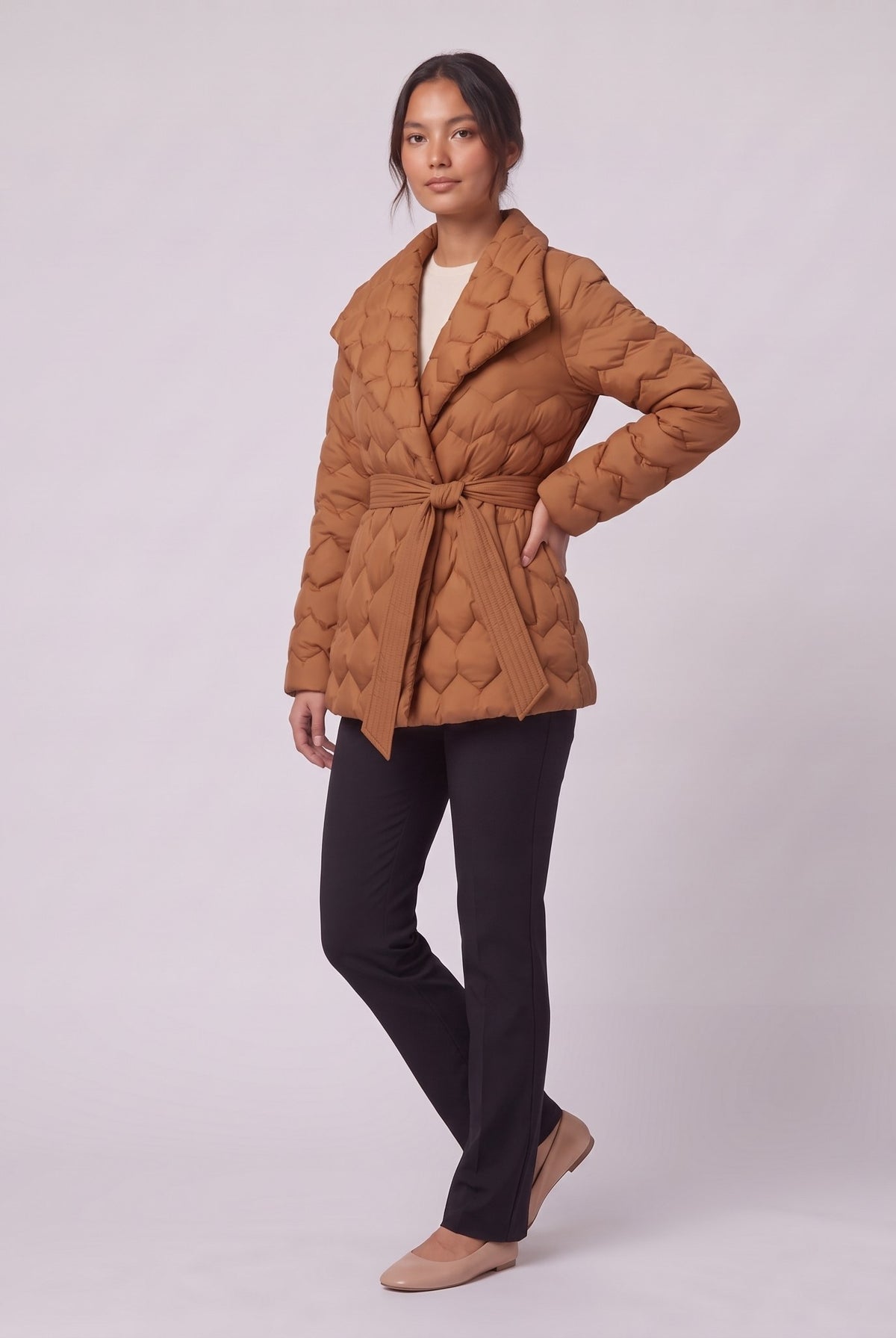 Ghislaine quilted belted jacket in caramel, three-quarter view showing the tied waist belt