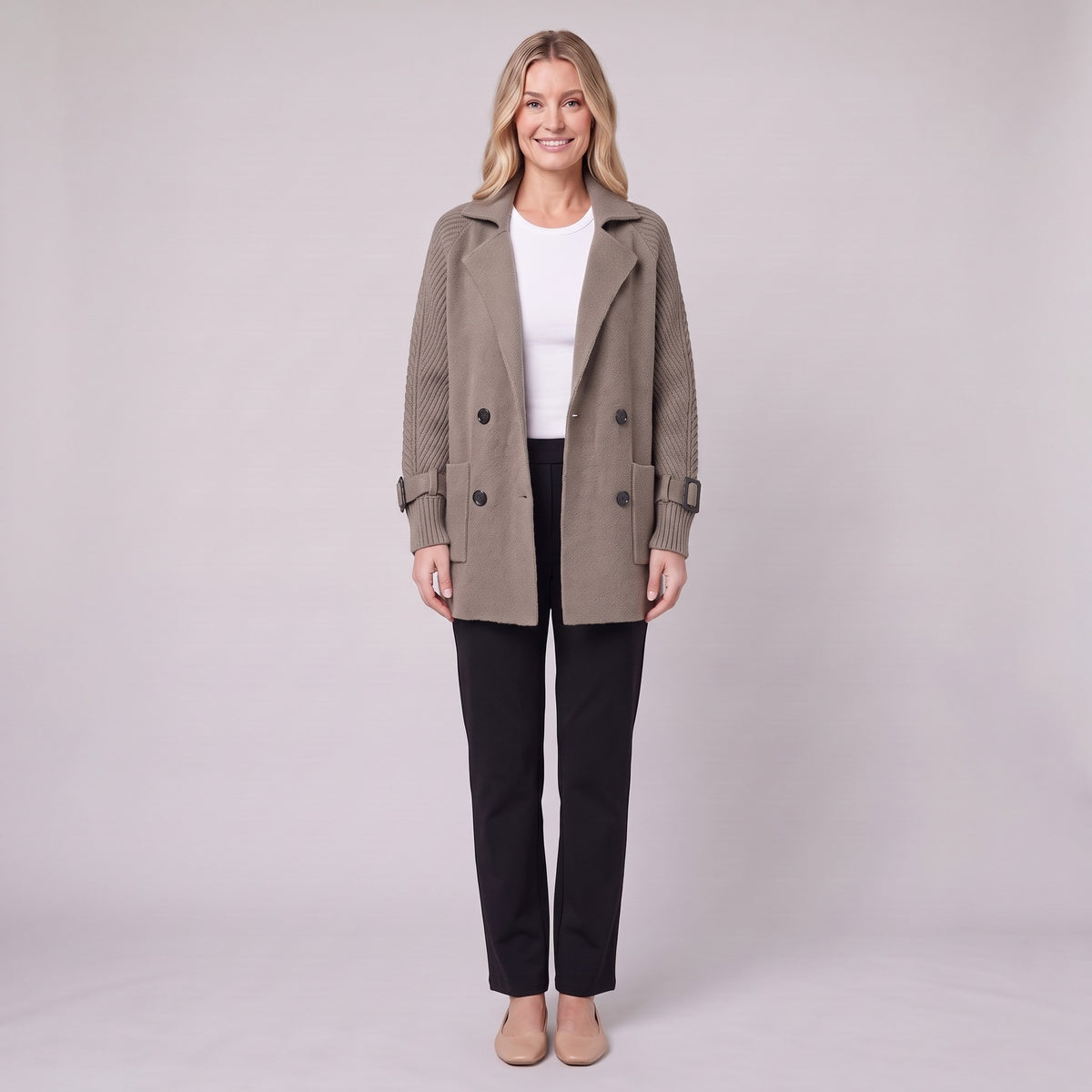 Gwenneth double-breasted knit coat in taupe with cable-knit sleeves, front view on model