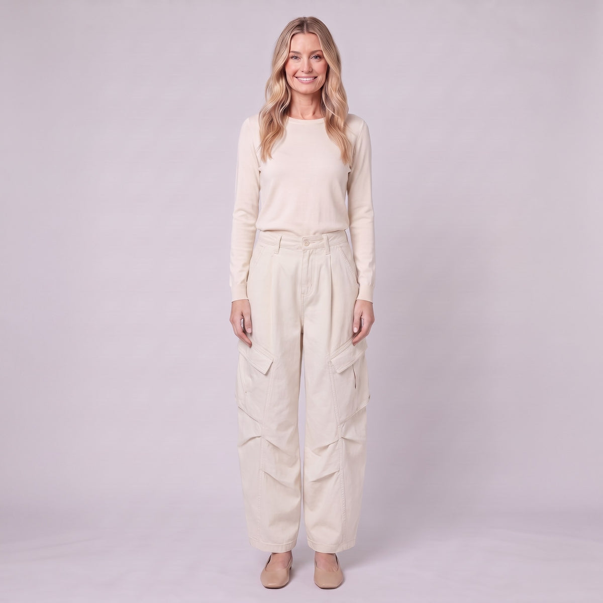 Inara baggy cargo trousers in cream ecru, front view on model