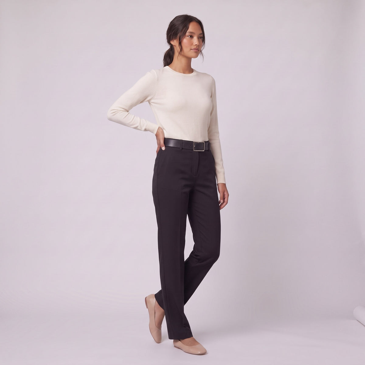 Ingeborg straight leg trousers in black twill, three-quarter view showing the belt and silver buckle