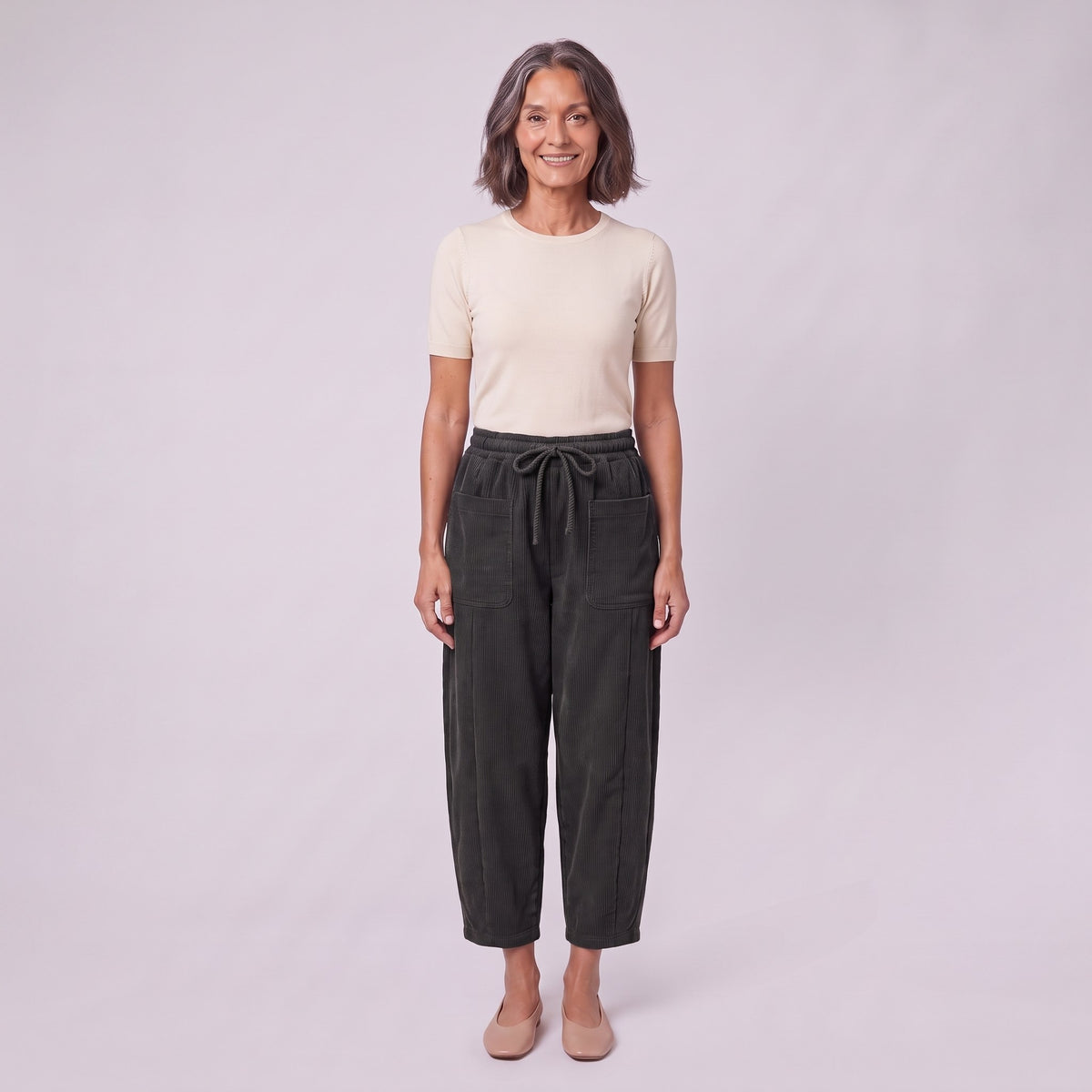 Kerensa barrel leg corduroy trousers in washed black, front view on model
