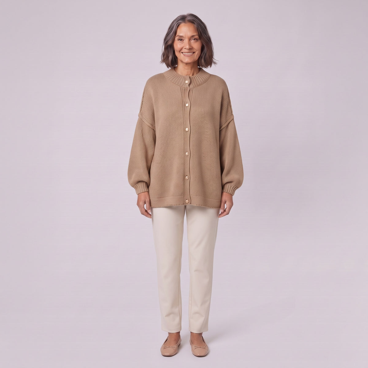 Magali oversized cardigan in camel, front view on model with cream trousers