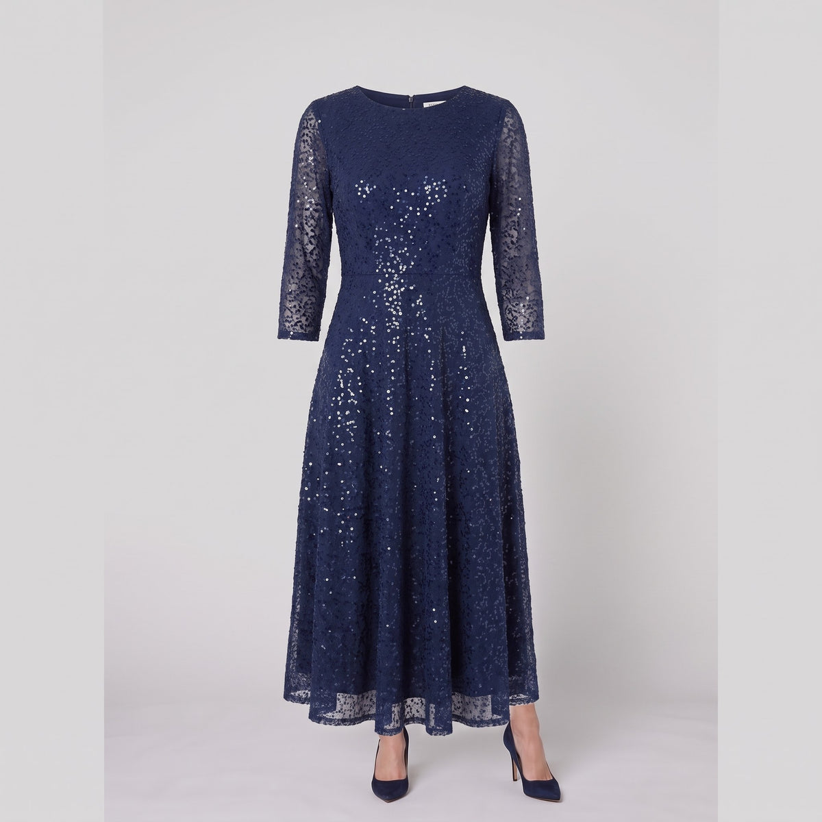 Novara navy sequin dress shown without a model on a light grey background