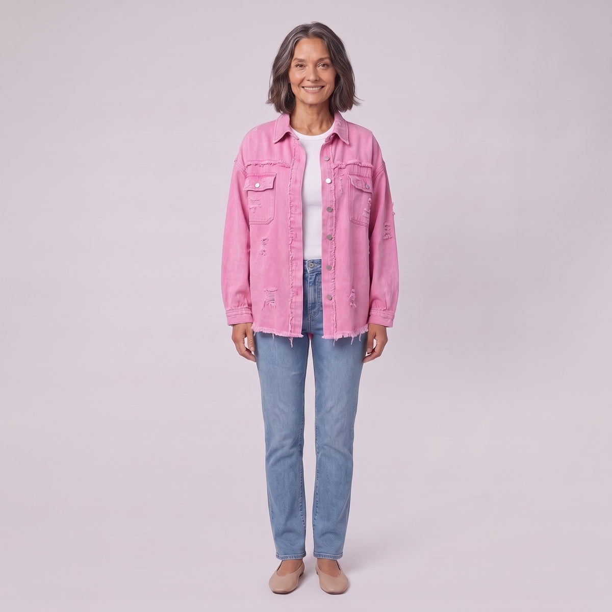 Saoirse distressed denim shacket in pink, oversized with raw hem, front view on model