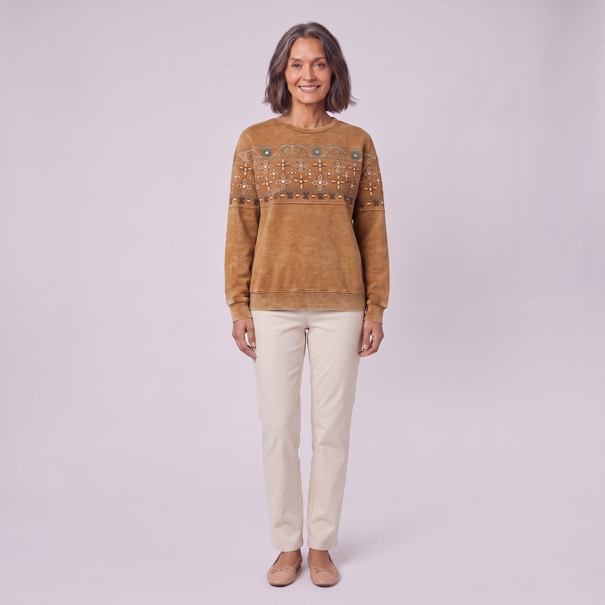 Sedona printed sweatshirt in caramel with folk border print, front view on model