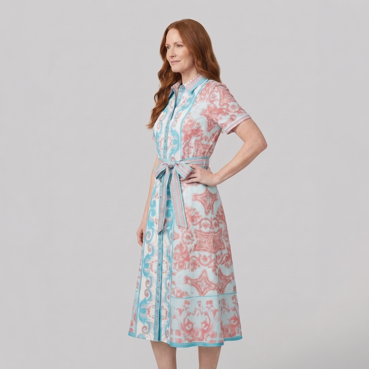 White collared midi dress with a belt, three-quarter side view