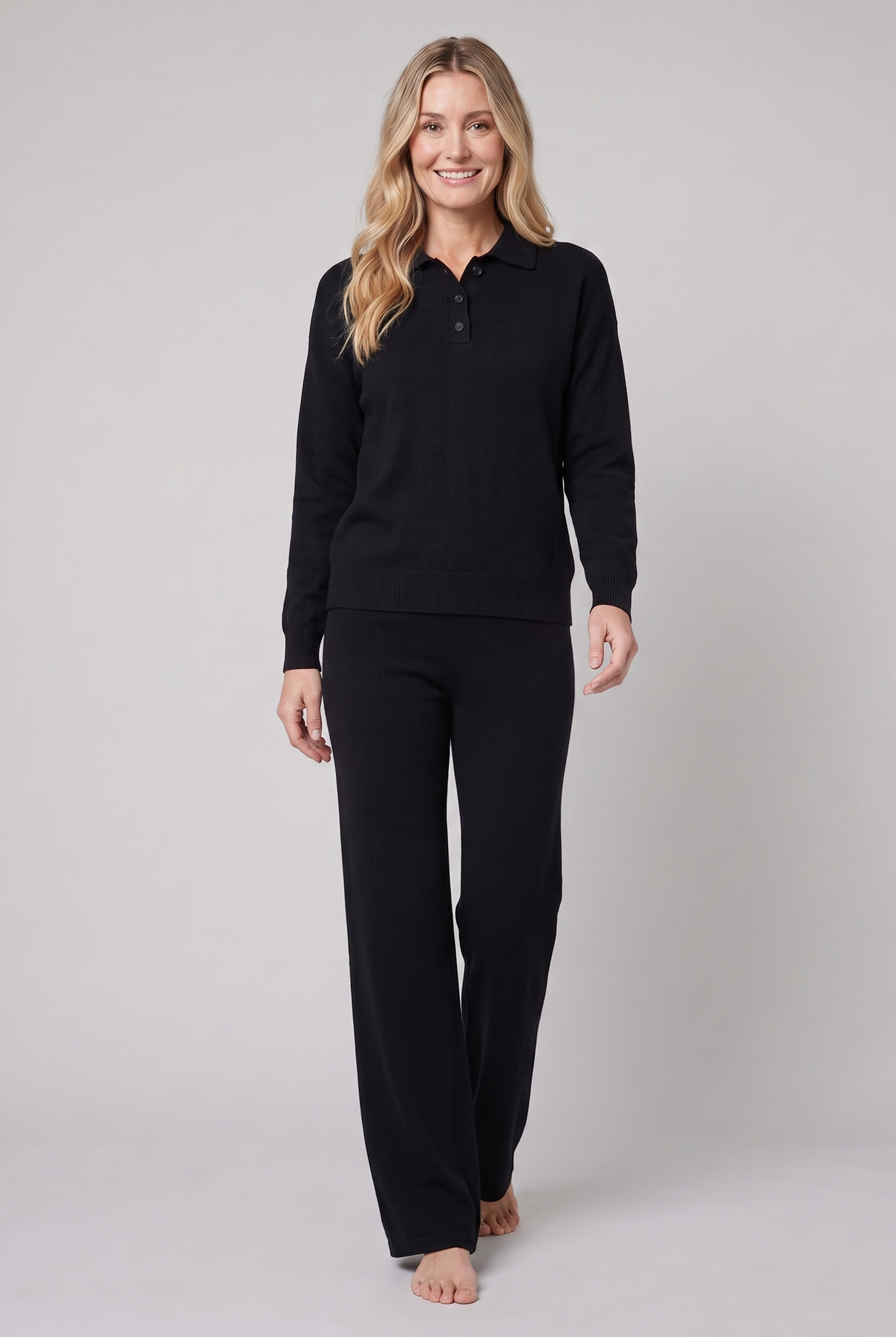 Pamina polo knit sweater and wide-leg trouser set in black on model