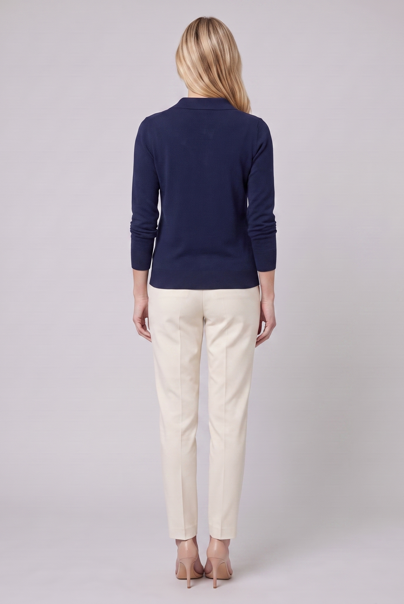 Romy knit cardigan in navy, back view on model