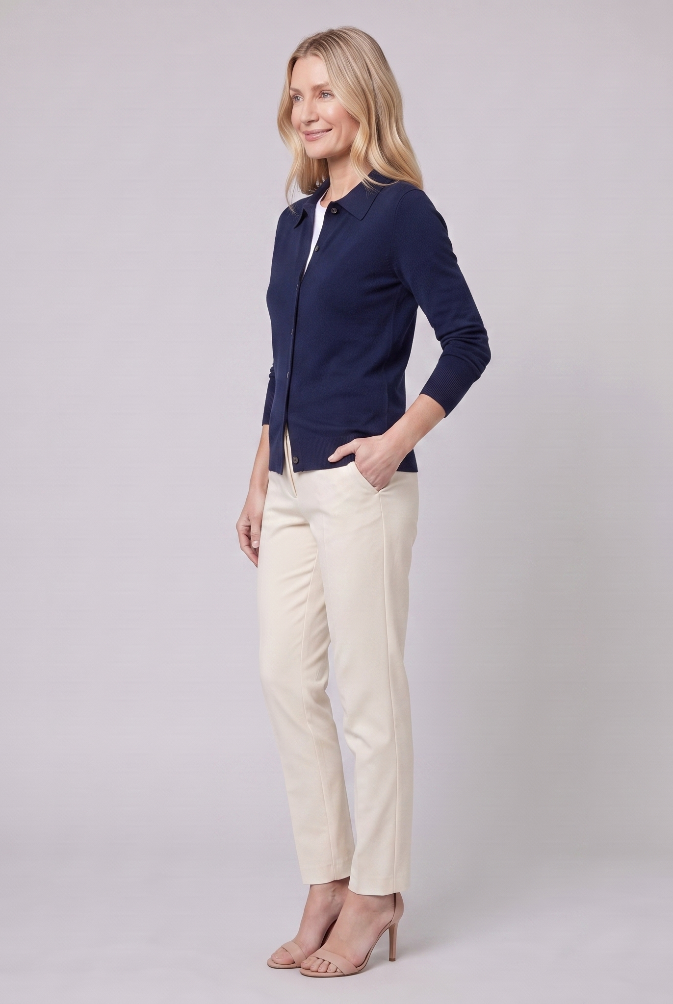 Romy knit cardigan in navy, side view on model