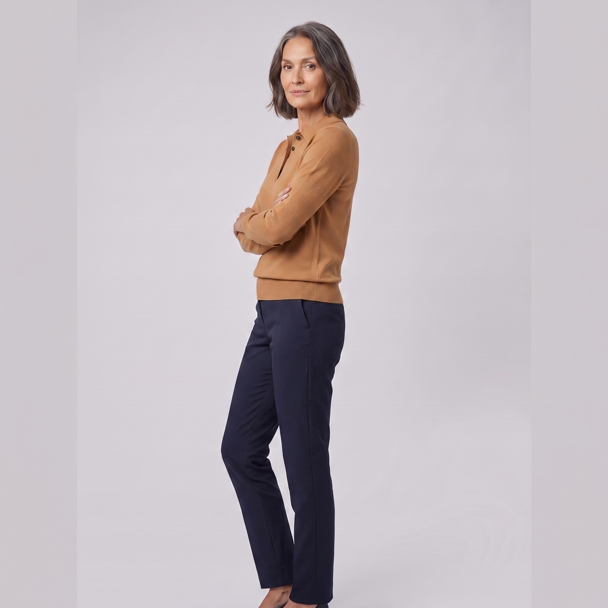 Rosalie knitted polo top in camel, side view on model