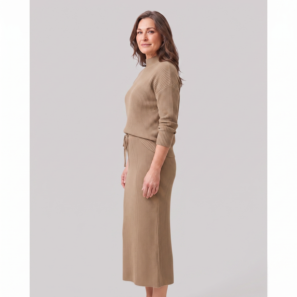 Soraya knit sweater and skirt set in taupe, side view on model