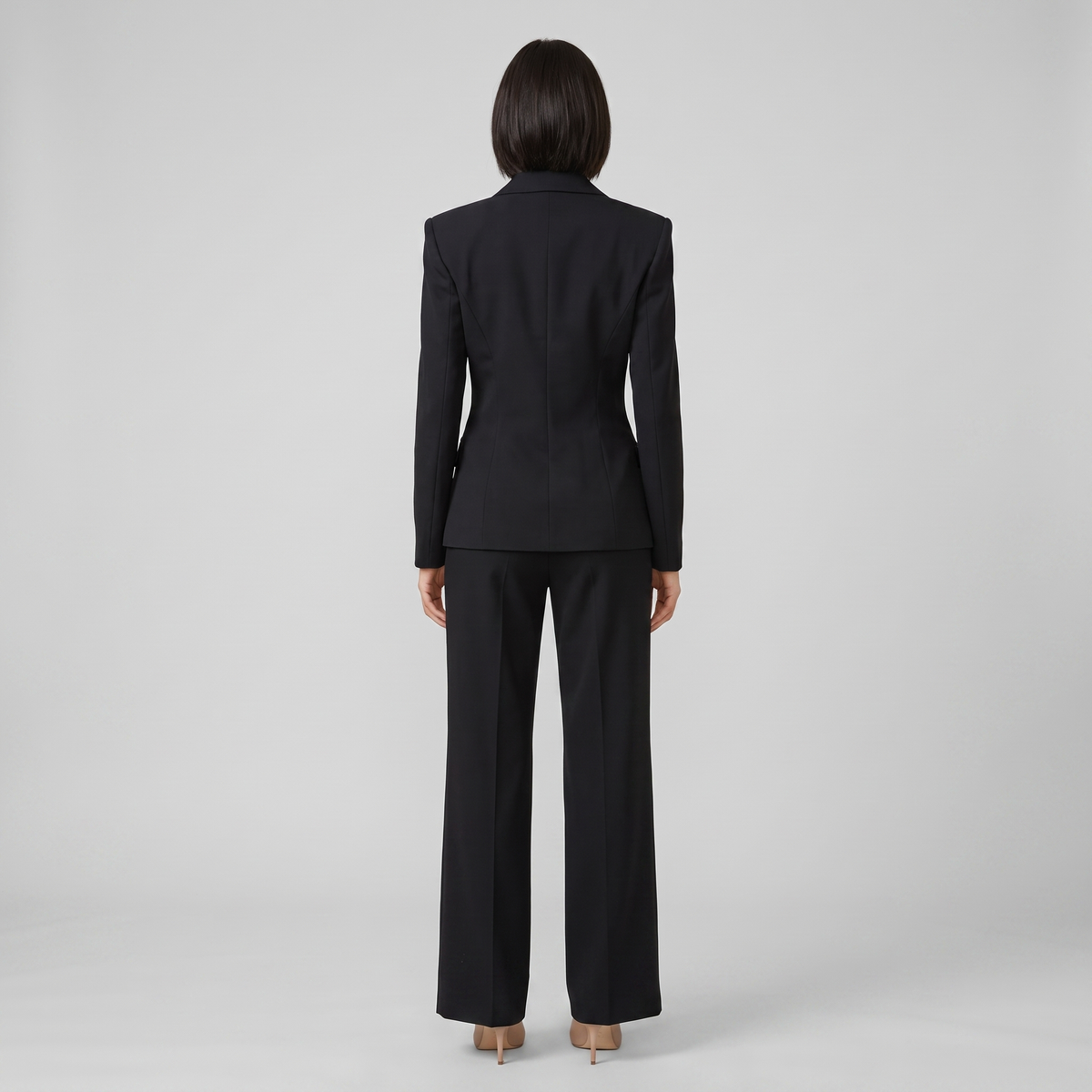 Wanda tailored suit in black, back view on model