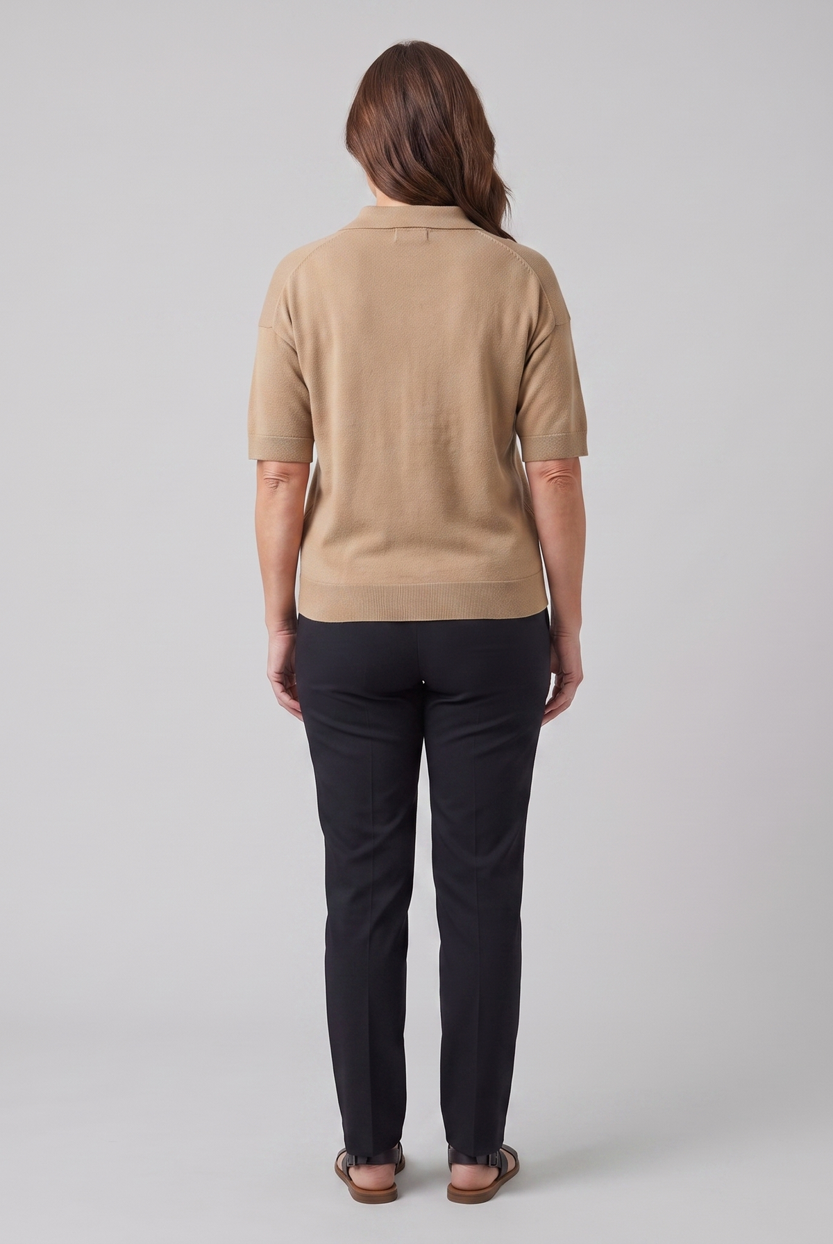 Willa knitted polo sweater in camel, back view on model
