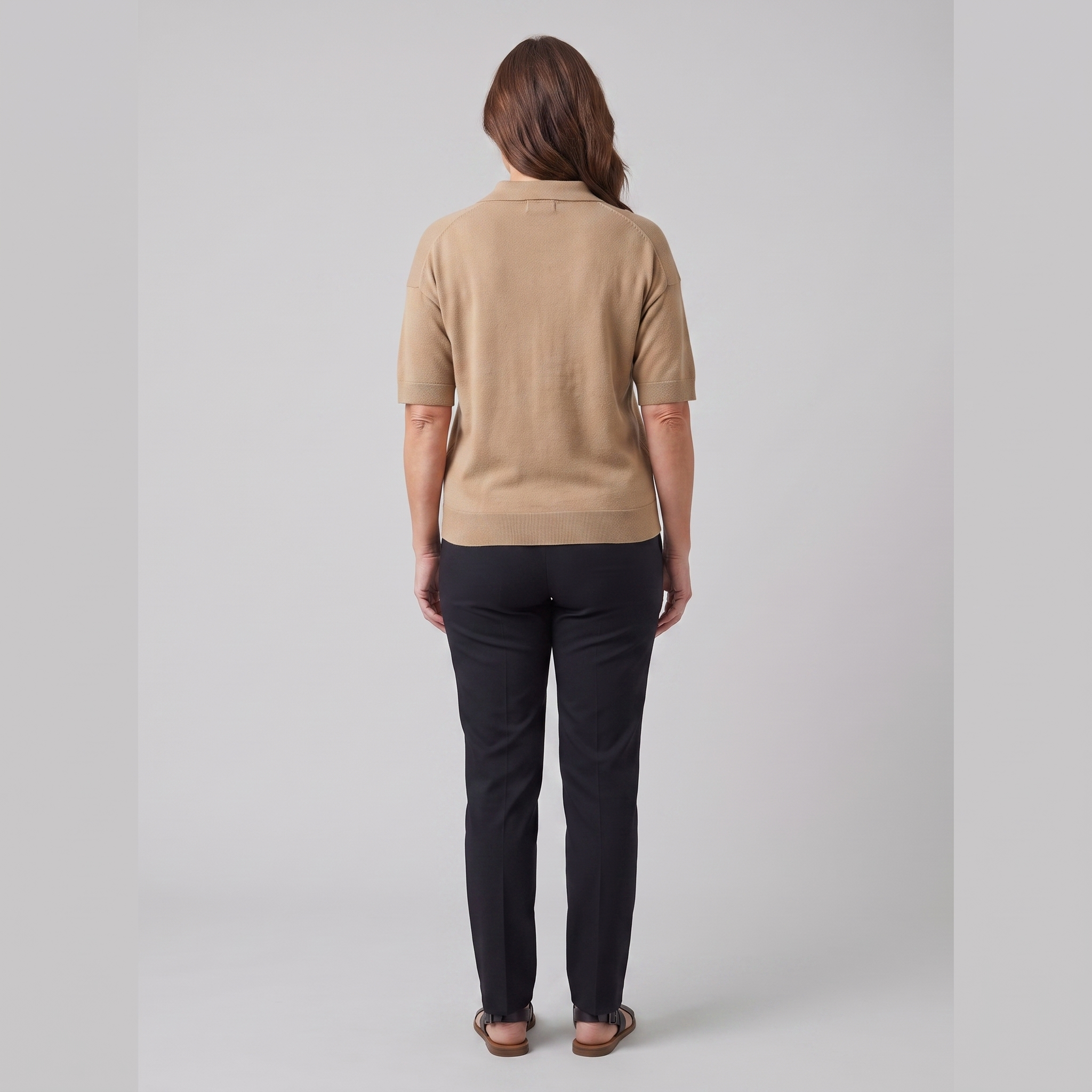 Willa knitted polo sweater in camel, back view on model