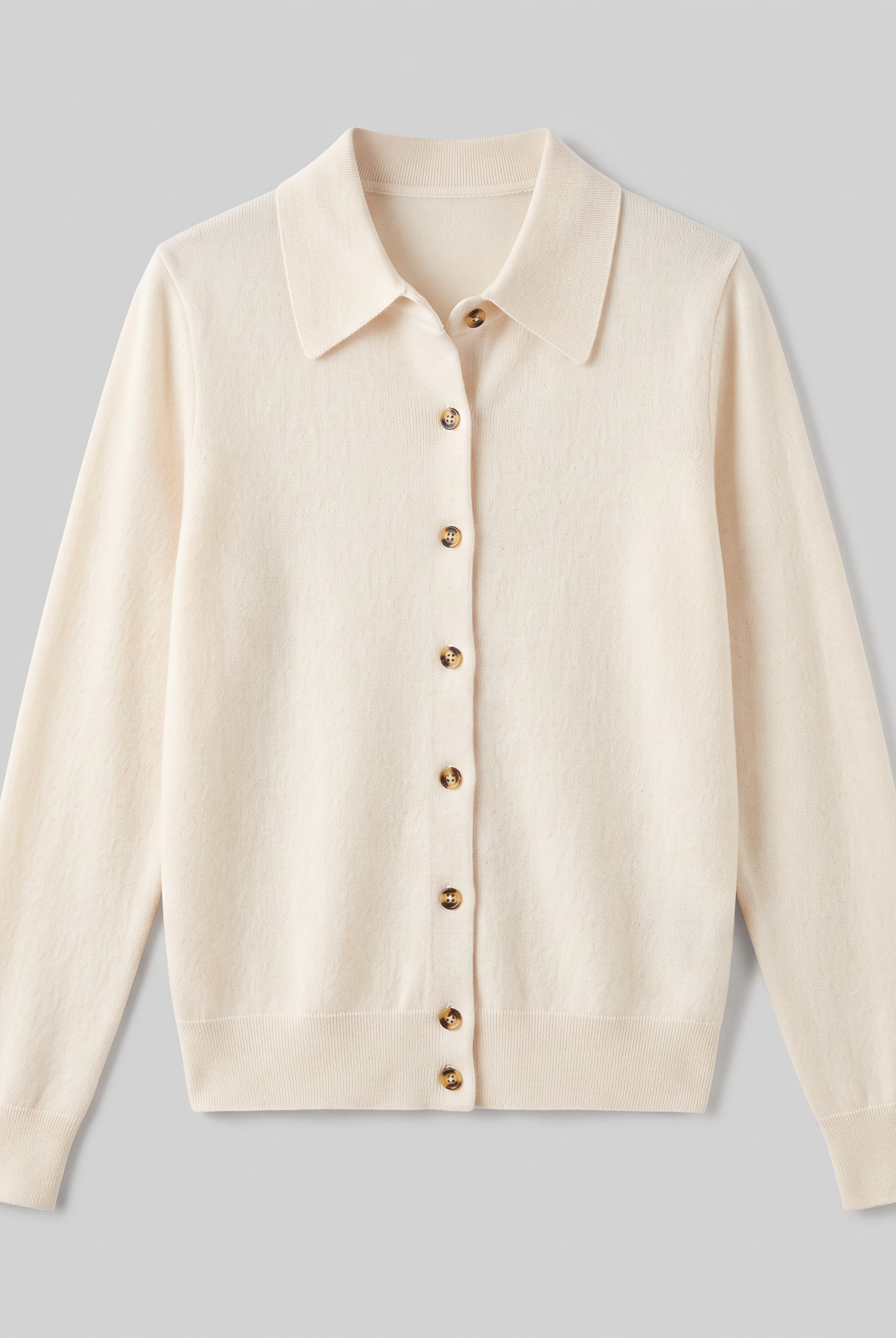 Winona wool-blend polo cardigan in cream, flat lay product shot