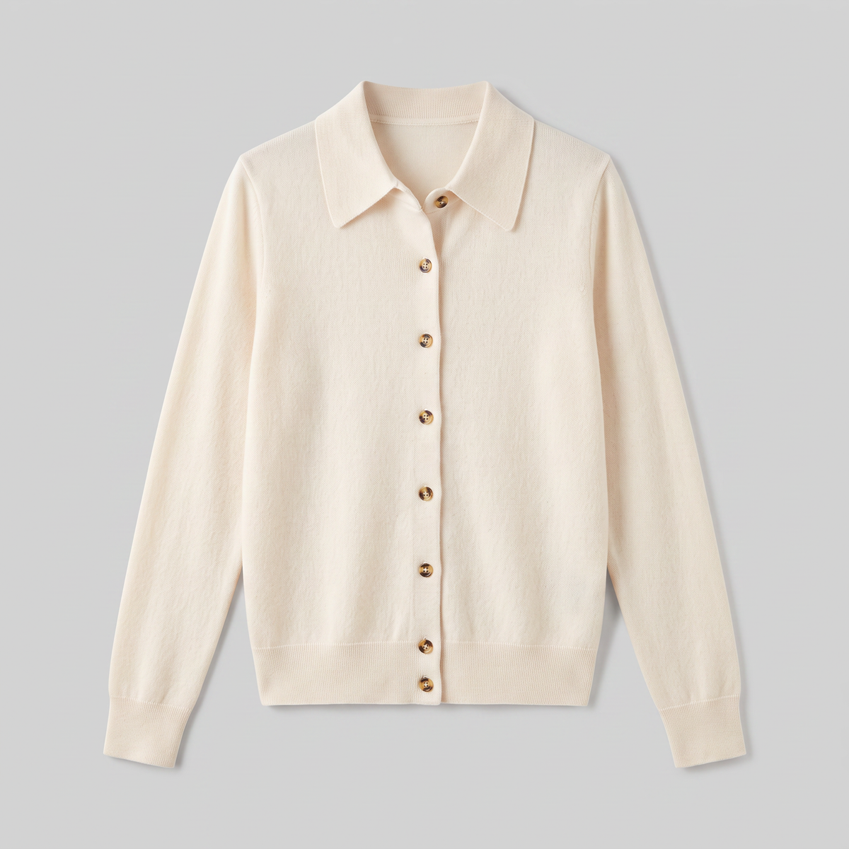 Winona wool-blend polo cardigan in cream, flat lay product shot