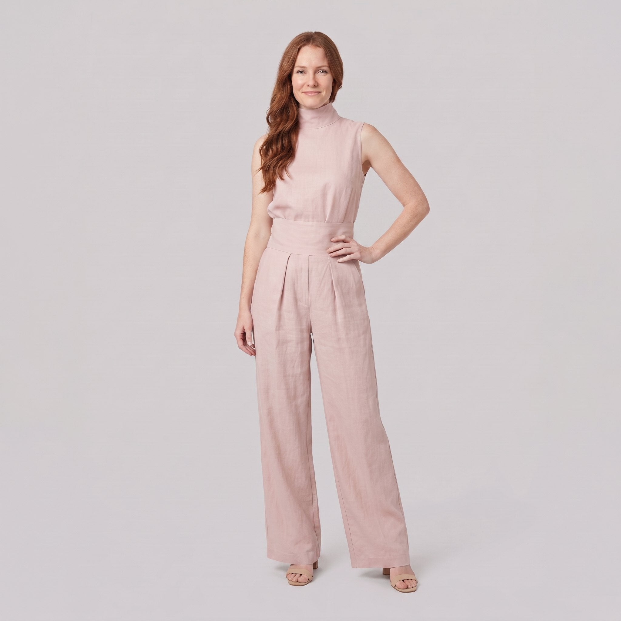 Mira two-piece set in light pink, sleeveless high-neck blouse with wide-leg trousers