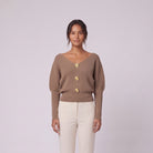 Boat neck jumper taupe with gold buttons close-up