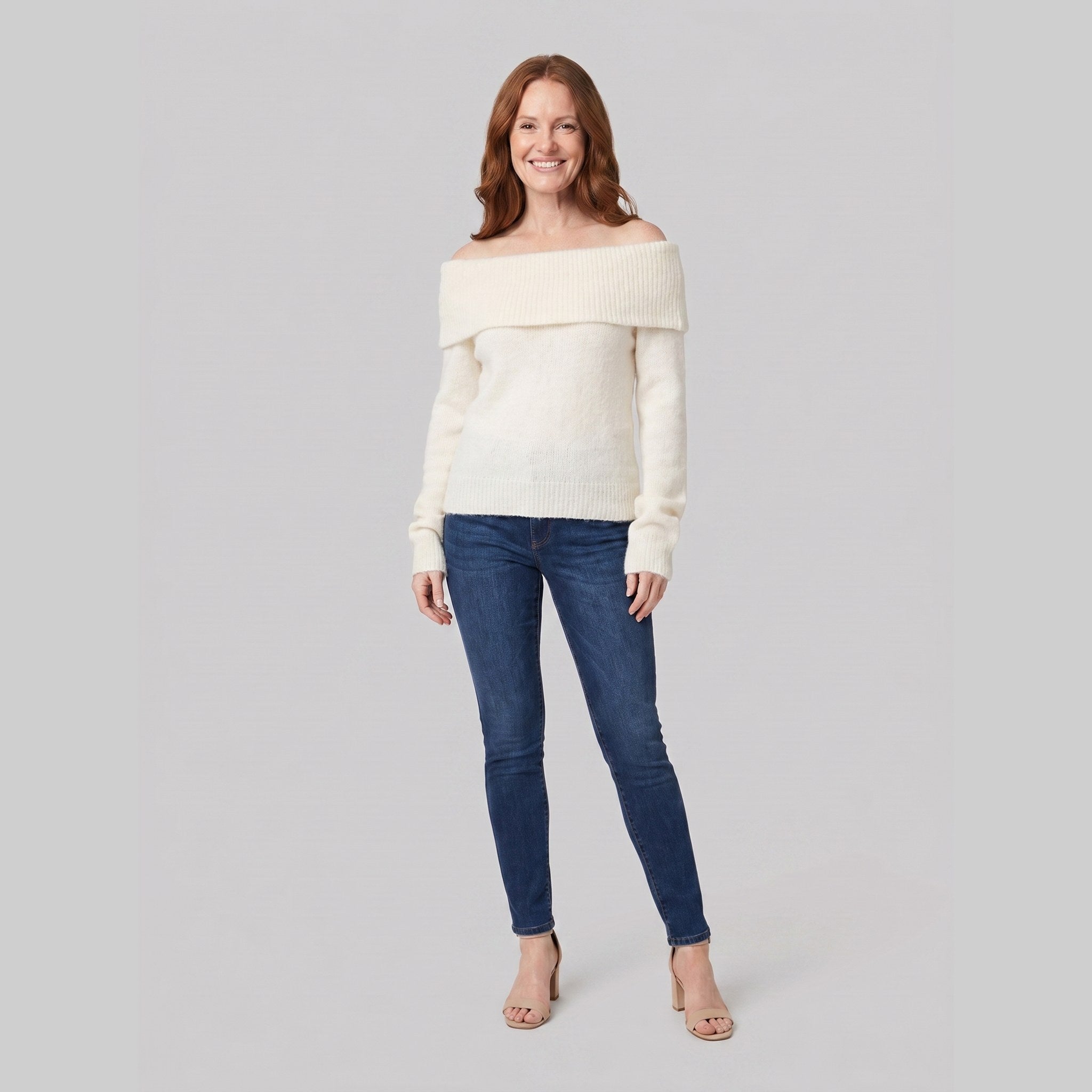 Clara off-shoulder knit top in cream on model
