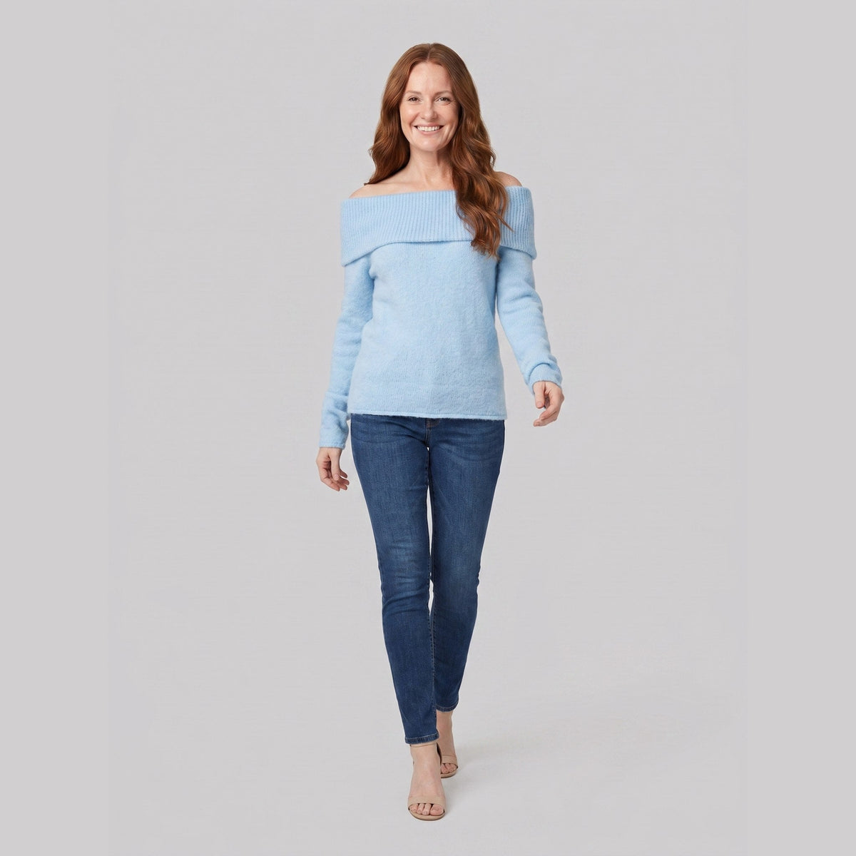 Clara off-shoulder knit top in light blue on model
