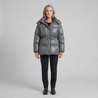 Cleo glossy quilted hooded puffer jacket in dark grey on model