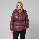 Cleo glossy quilted hooded puffer jacket in dark red on model