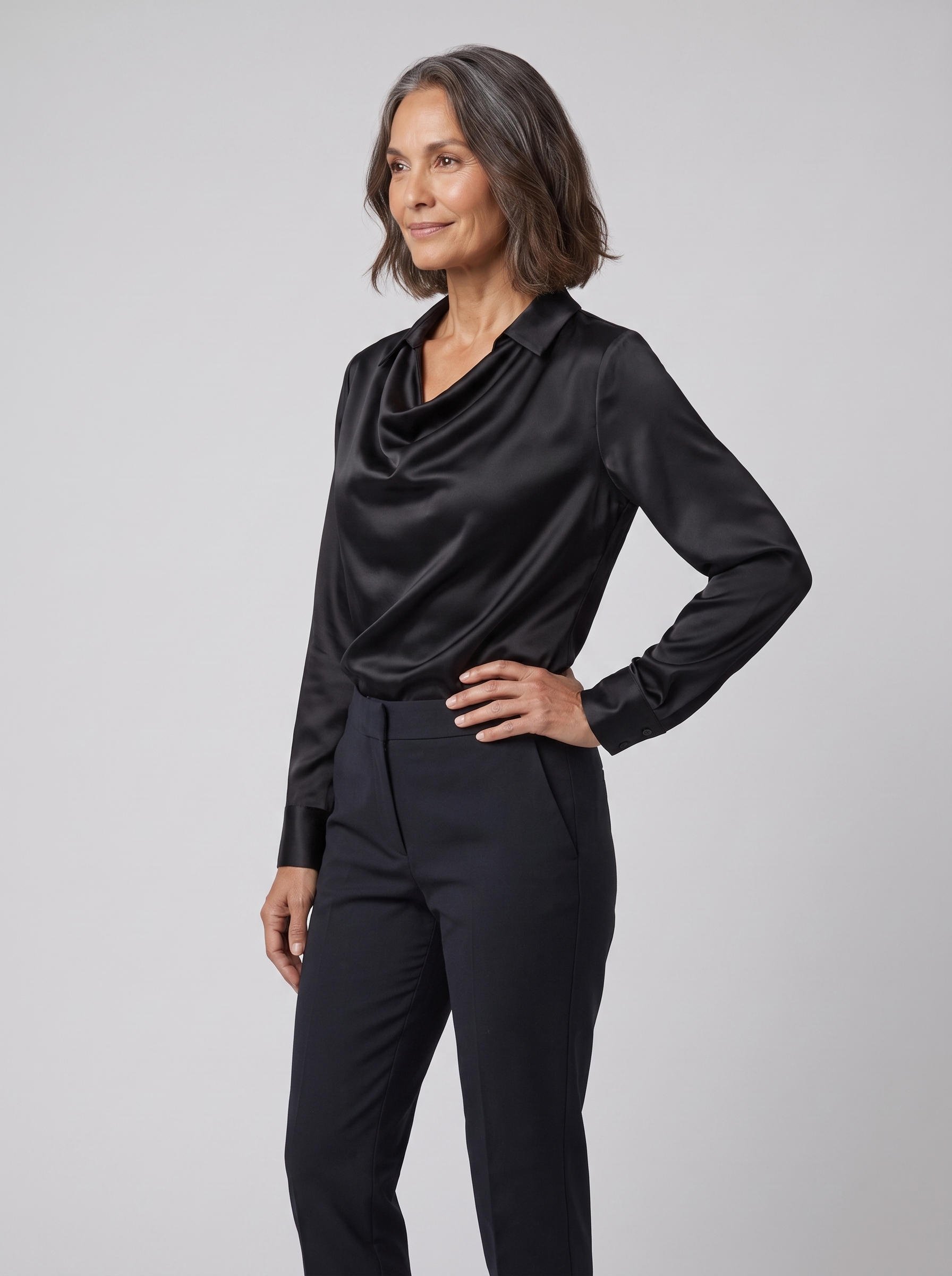 Dalia draped cowl-neck blouse in black on model