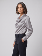 Dalia draped cowl-neck blouse in silver on model