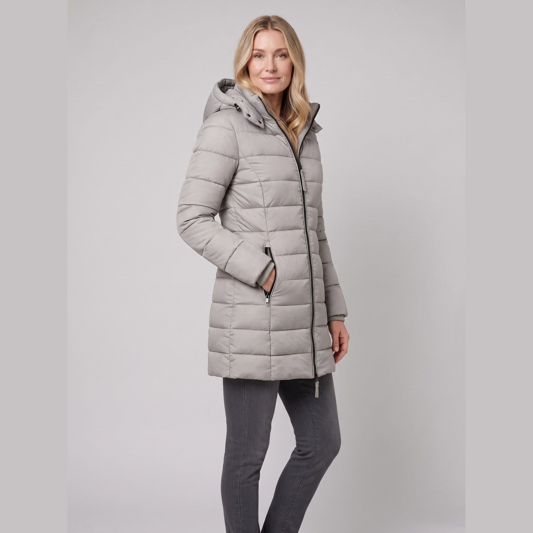 Evara lightweight hooded puffer jacket in grey on model