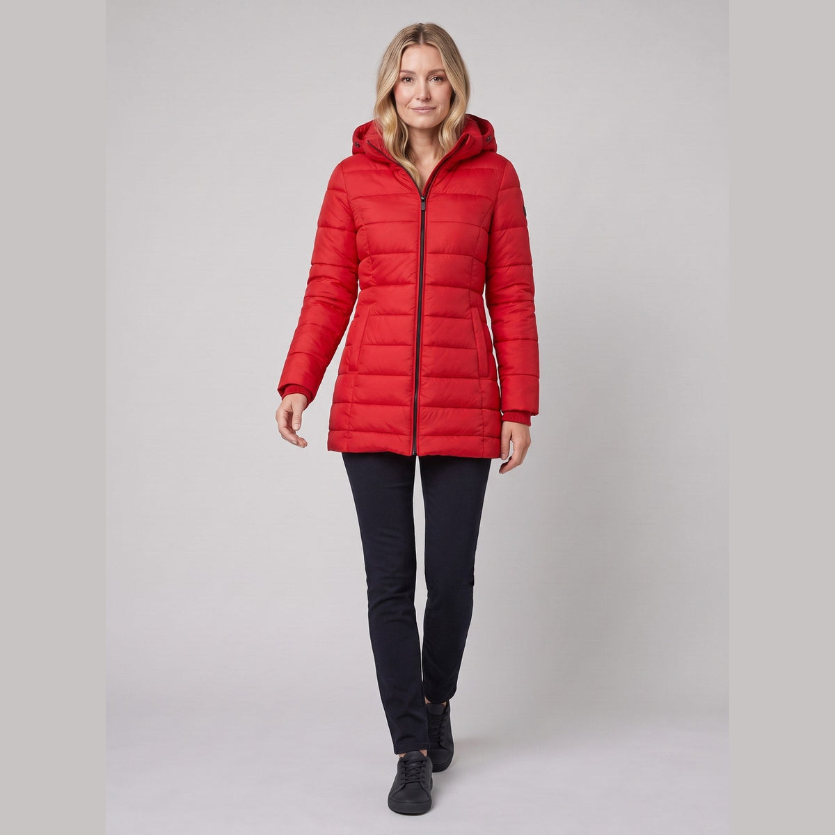 Evara lightweight hooded puffer jacket in red on model