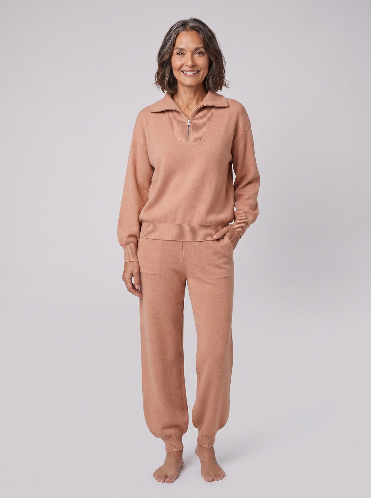 Fjorda half-zip knit lounge set in peach on model