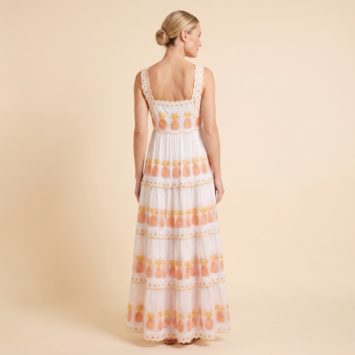 White square-neck tiered maxi dress with pineapple embroidery, back view on model