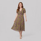 Virel Floral Midi Dress walking pose on model