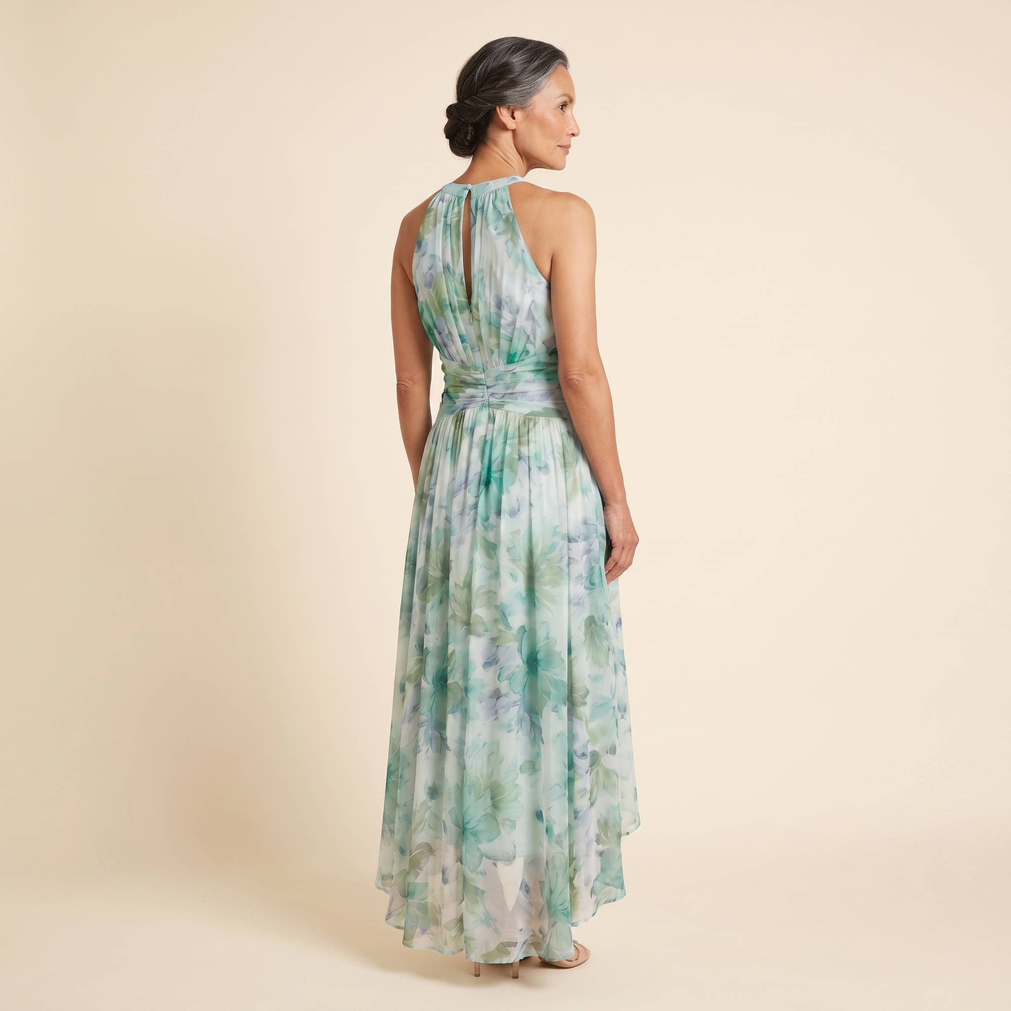 Poppy Dress green floral halter midi back view on model