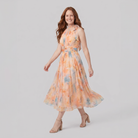 Elysian Midi Dress walking pose on model