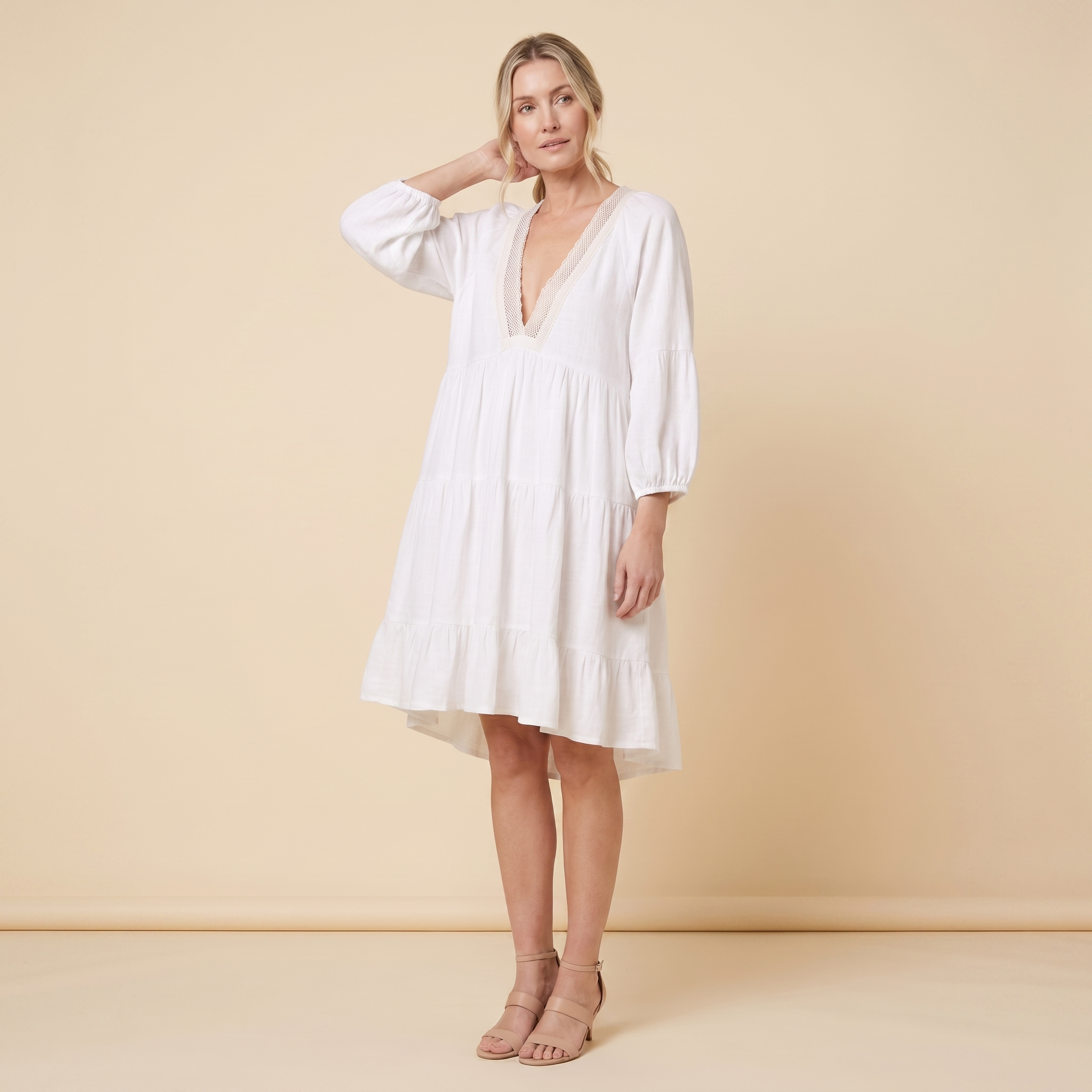 Bella Mini Dress White - three quarter angle on model